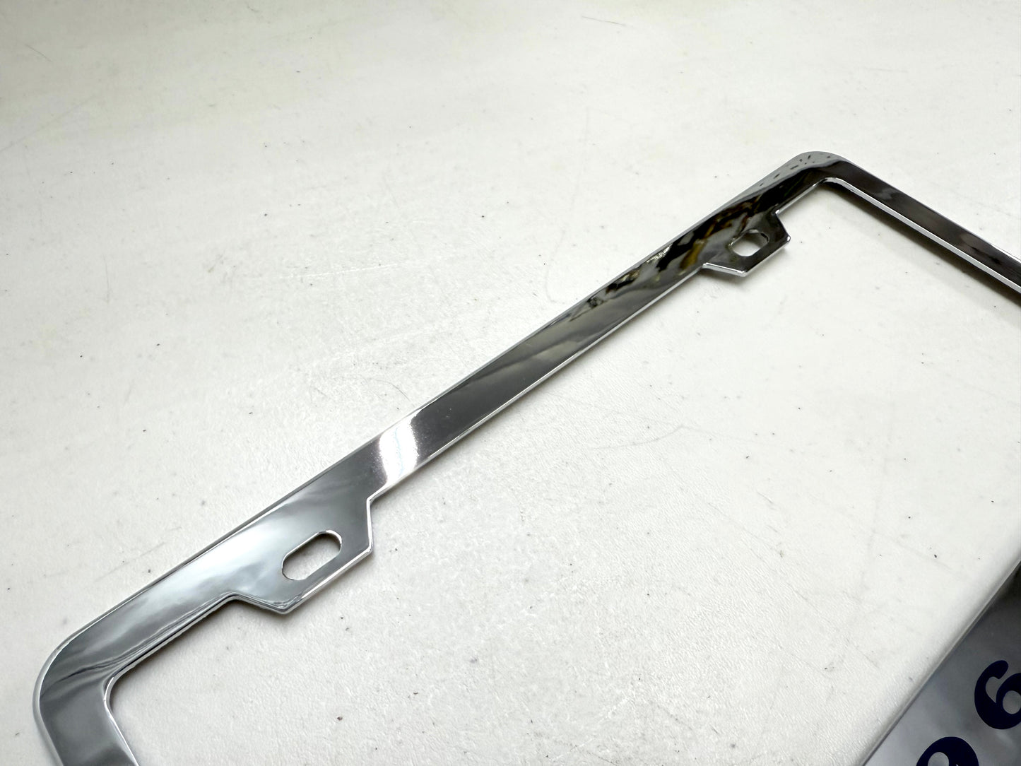 1962 CHEVROLET IMPALA, BEL AIR, BISCAYNE CHROME LICENSE PLATE FRAME WITH DUAL CHEVY BOWTIE LOGOS (2 HOLES)