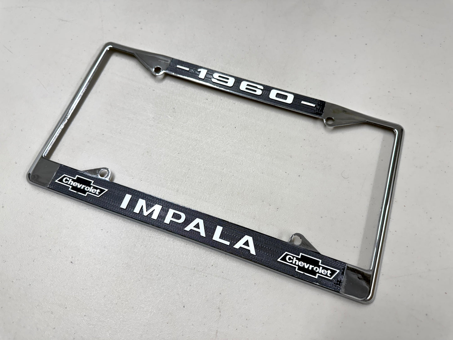 1960 CHEVY IMPALA GM LICENSED FRONT REAR LICENSE PLATE HOLDER RETAINER FRAME WITH DUAL BOWTIE LOGOS