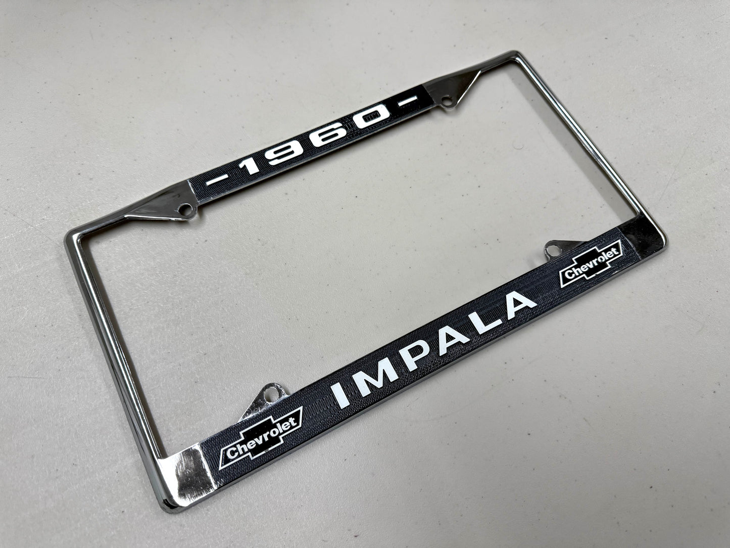1960 CHEVY IMPALA GM LICENSED FRONT REAR LICENSE PLATE HOLDER RETAINER FRAME WITH DUAL BOWTIE LOGOS