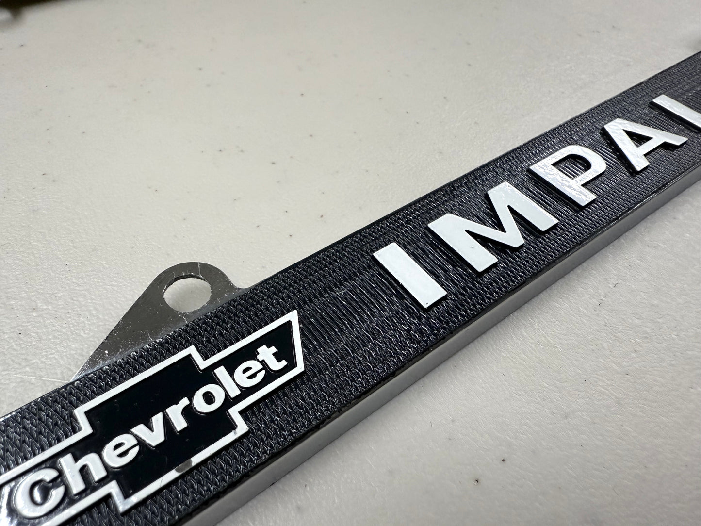 1960 CHEVY IMPALA GM LICENSED FRONT REAR LICENSE PLATE HOLDER RETAINER FRAME WITH DUAL BOWTIE LOGOS