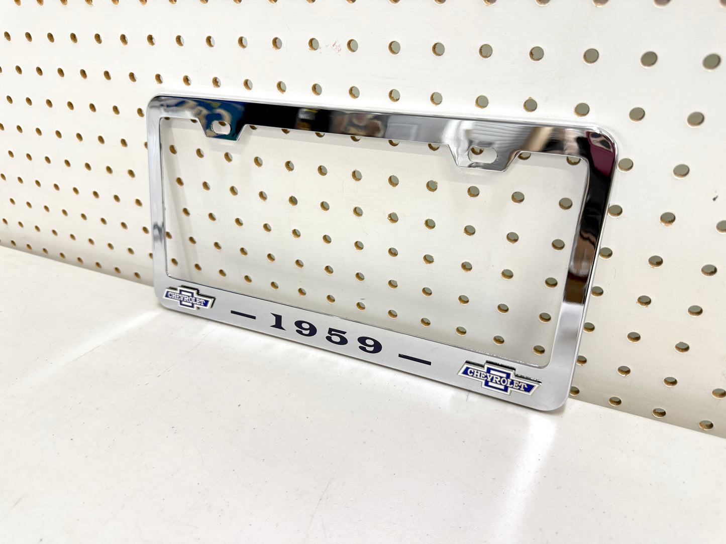 1959 CHEVROLET IMPALA, BEL AIR, BISCAYNE CHROME LICENSE PLATE FRAME WITH DUAL CHEVY BOWTIE LOGOS (2 HOLES)