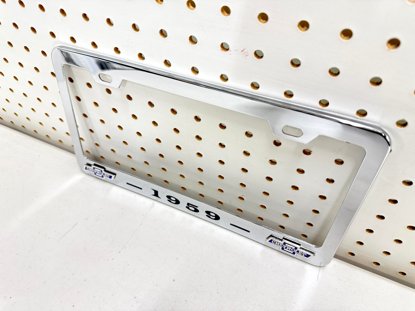 1959 CHEVROLET IMPALA, BEL AIR, BISCAYNE CHROME LICENSE PLATE FRAME WITH DUAL CHEVY BOWTIE LOGOS (2 HOLES)