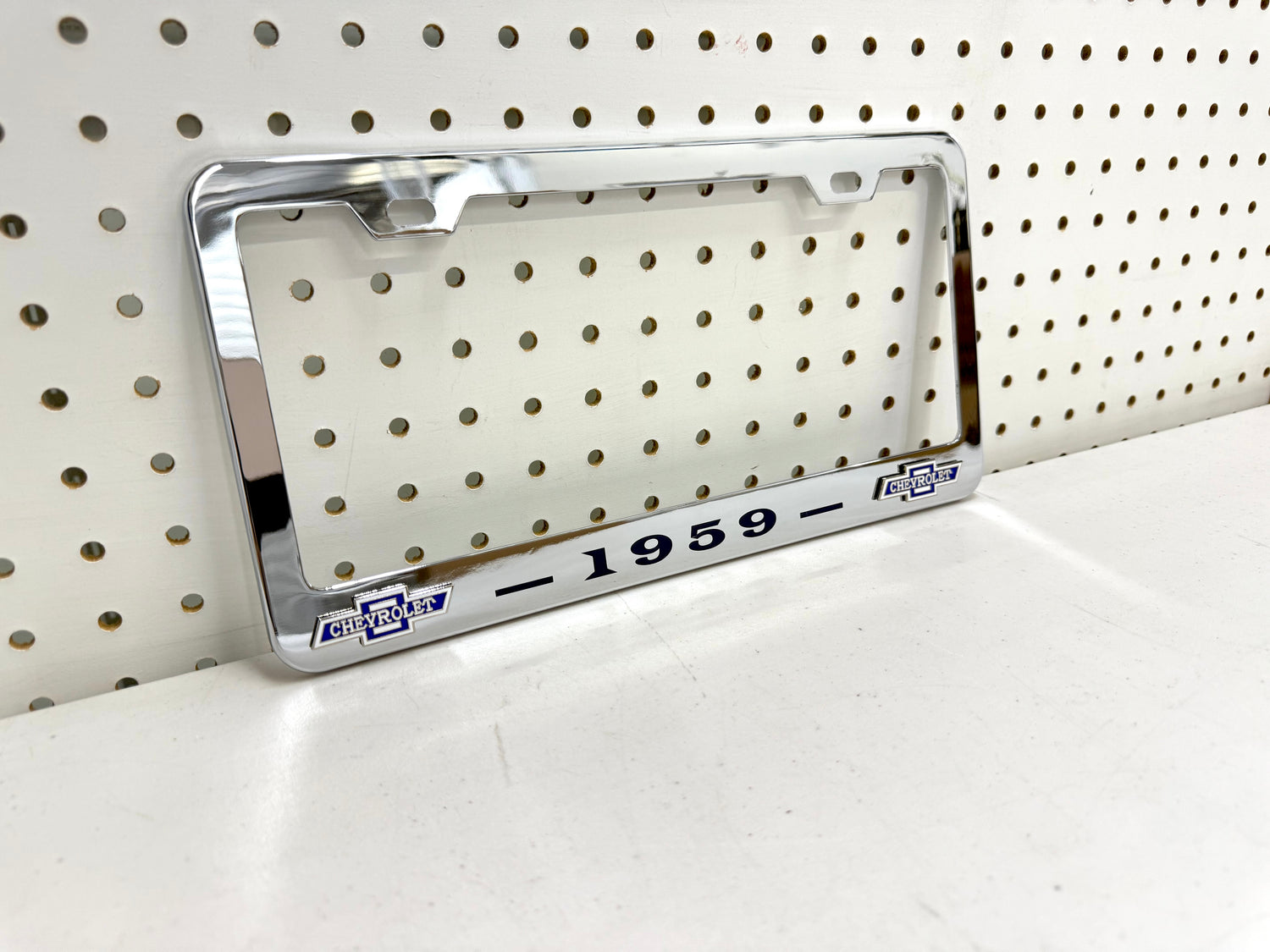 1959 CHEVROLET IMPALA, BEL AIR, BISCAYNE CHROME LICENSE PLATE FRAME WITH DUAL CHEVY BOWTIE LOGOS (2 HOLES)
