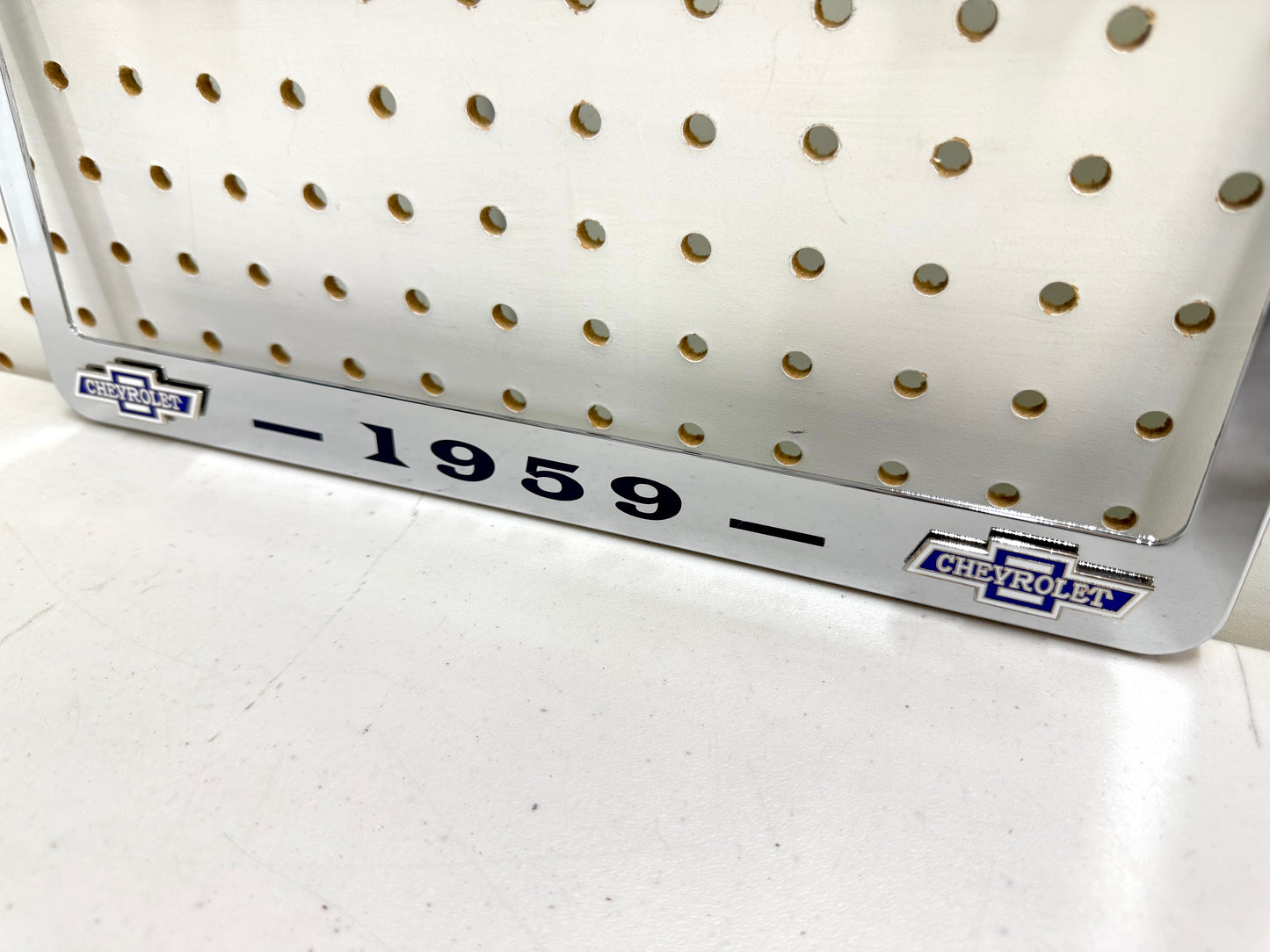 1959 CHEVROLET IMPALA, BEL AIR, BISCAYNE CHROME LICENSE PLATE FRAME WITH DUAL CHEVY BOWTIE LOGOS (2 HOLES)