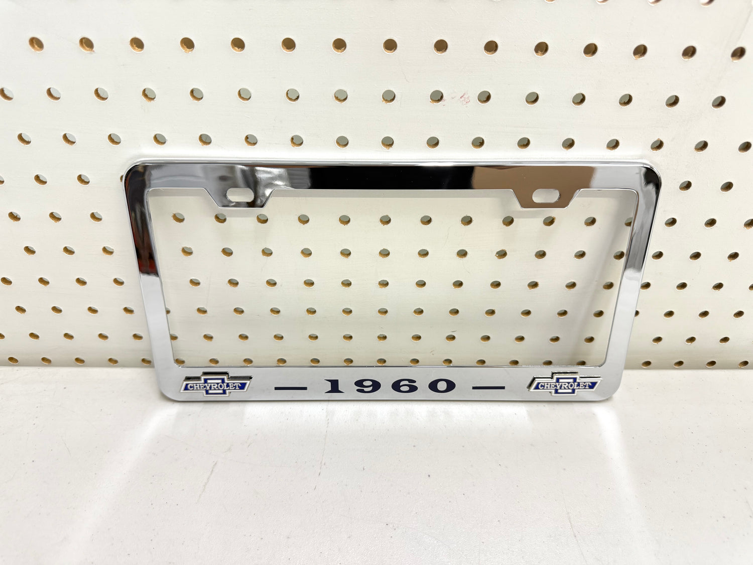 1960 CHEVROLET IMPALA, BEL AIR, BISCAYNE CHROME LICENSE PLATE FRAME WITH DUAL CHEVY BOWTIE LOGOS (2 HOLES)