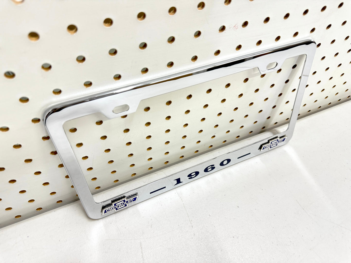 1960 CHEVROLET IMPALA, BEL AIR, BISCAYNE CHROME LICENSE PLATE FRAME WITH DUAL CHEVY BOWTIE LOGOS (2 HOLES)