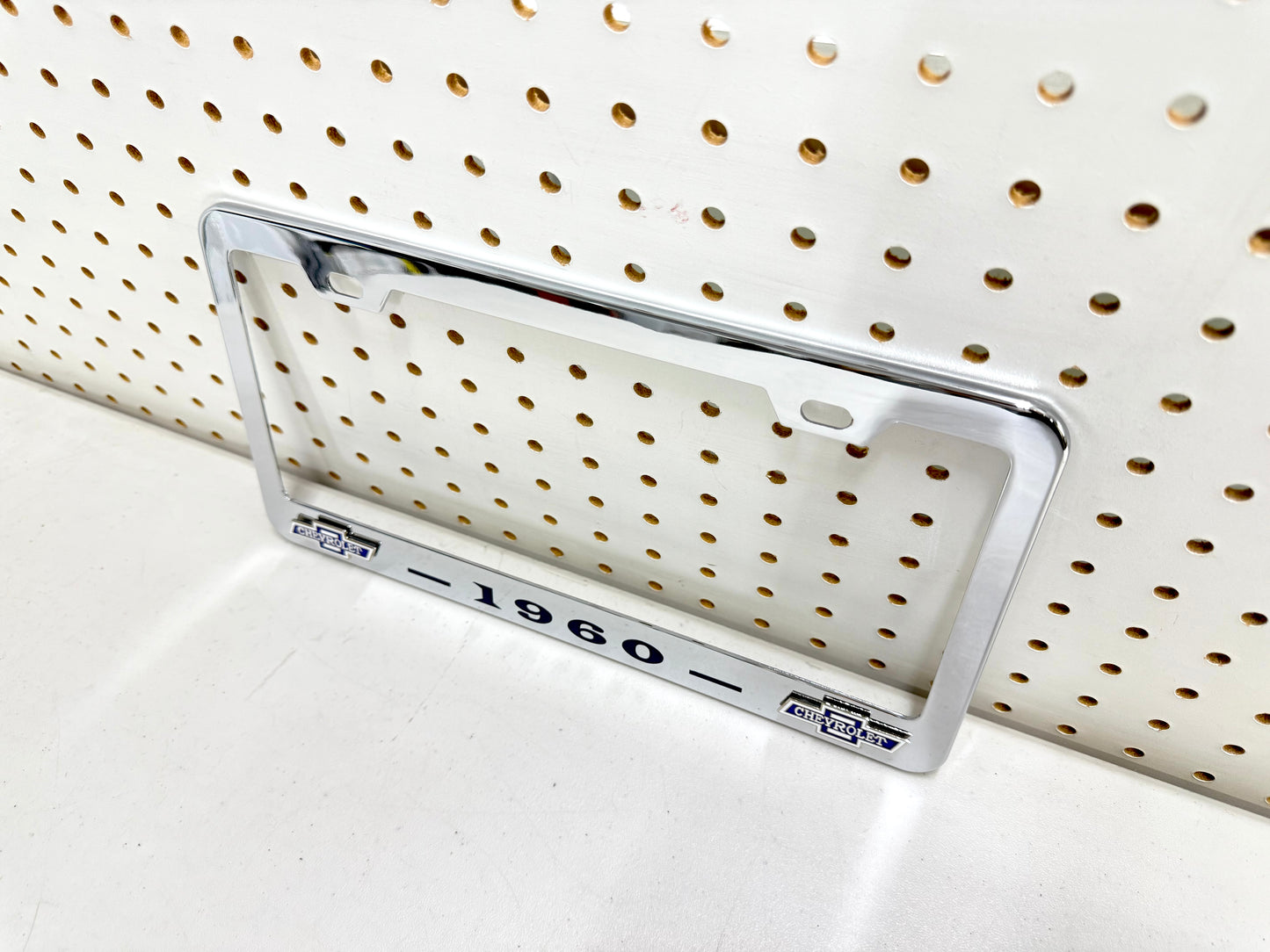 1960 CHEVROLET IMPALA, BEL AIR, BISCAYNE CHROME LICENSE PLATE FRAME WITH DUAL CHEVY BOWTIE LOGOS (2 HOLES)