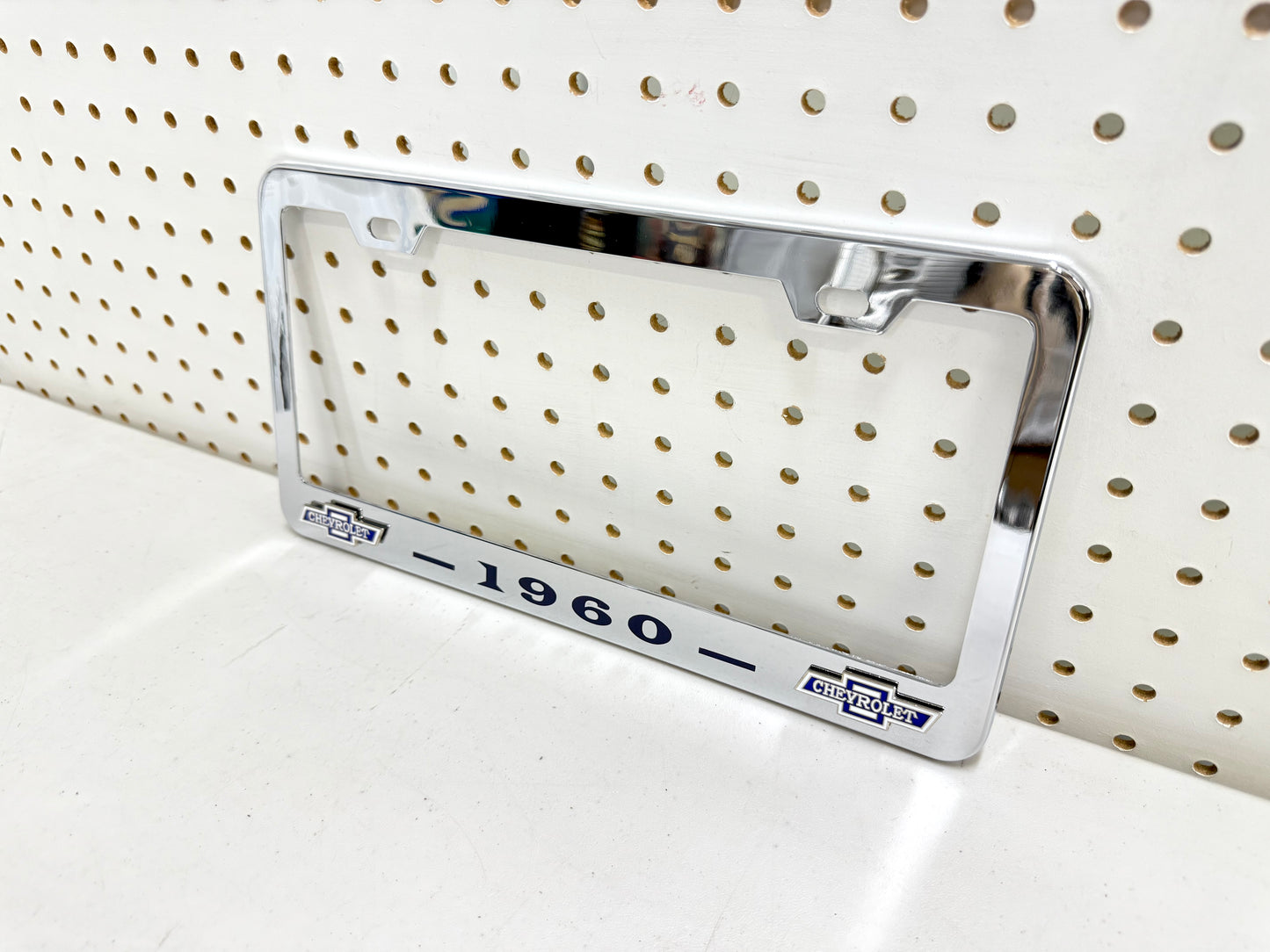 1960 CHEVROLET IMPALA, BEL AIR, BISCAYNE CHROME LICENSE PLATE FRAME WITH DUAL CHEVY BOWTIE LOGOS (2 HOLES)