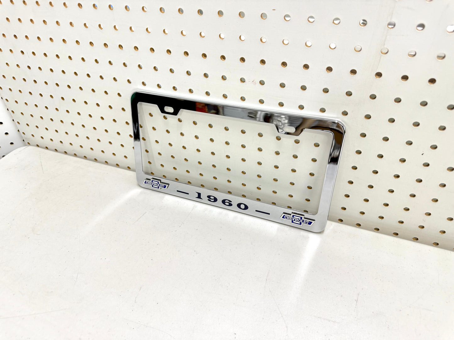 1960 CHEVROLET IMPALA, BEL AIR, BISCAYNE CHROME LICENSE PLATE FRAME WITH DUAL CHEVY BOWTIE LOGOS (2 HOLES)