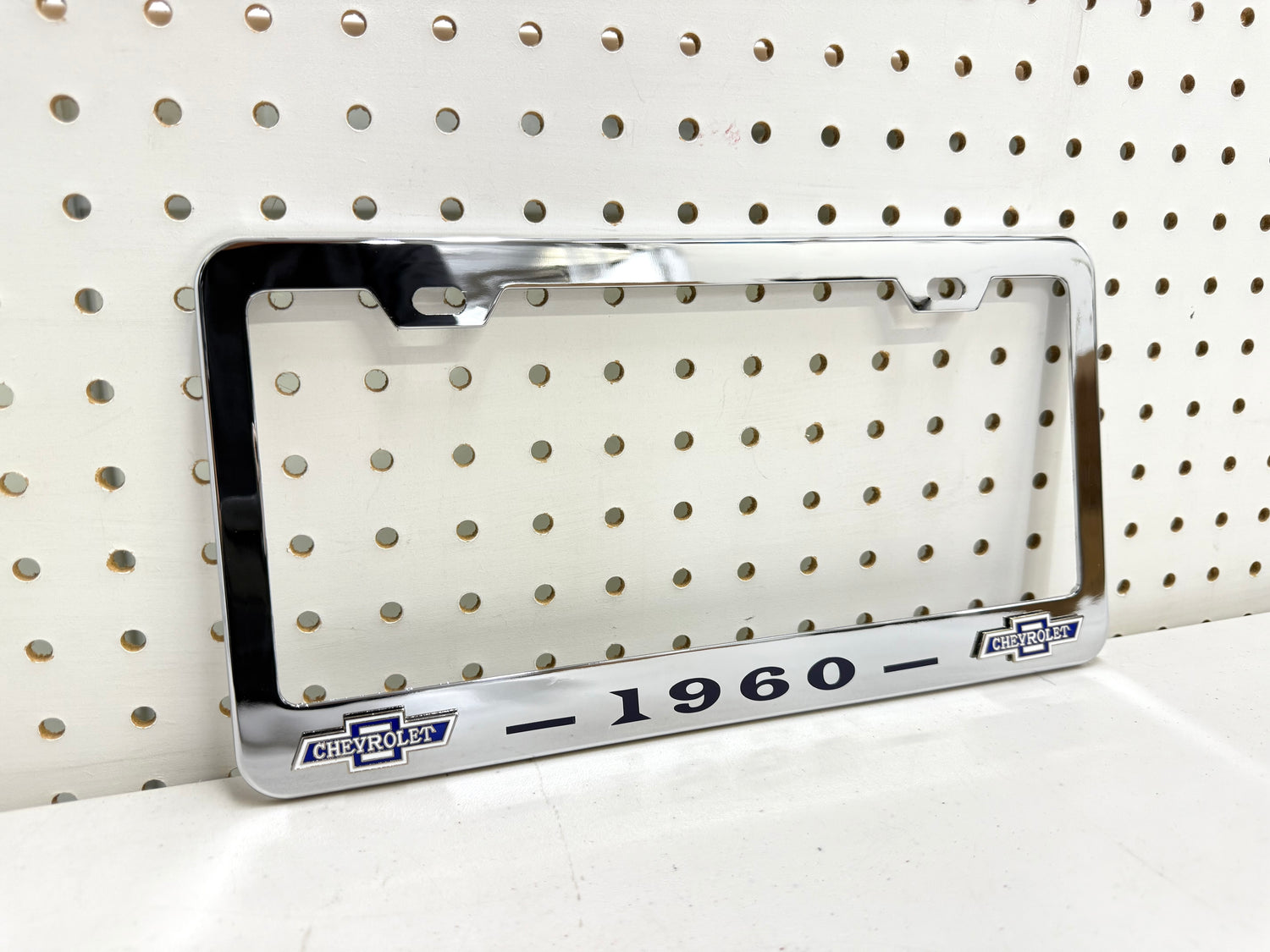 1960 CHEVROLET IMPALA, BEL AIR, BISCAYNE CHROME LICENSE PLATE FRAME WITH DUAL CHEVY BOWTIE LOGOS (2 HOLES)