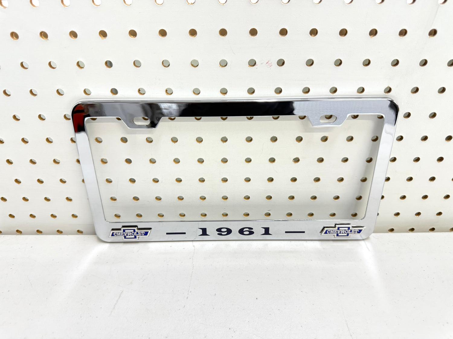 1961 CHEVROLET IMPALA, BEL AIR, BISCAYNE CHROME LICENSE PLATE FRAME WITH DUAL CHEVY BOWTIE LOGOS (2 HOLES)