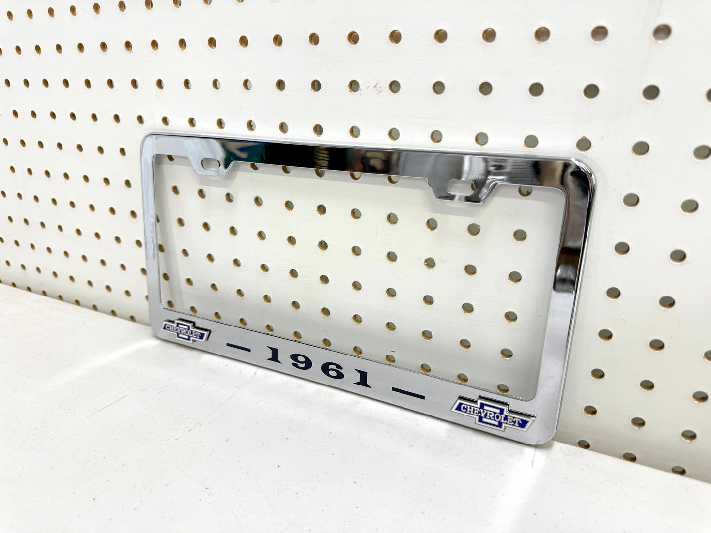 1961 CHEVROLET IMPALA, BEL AIR, BISCAYNE CHROME LICENSE PLATE FRAME WITH DUAL CHEVY BOWTIE LOGOS (2 HOLES)