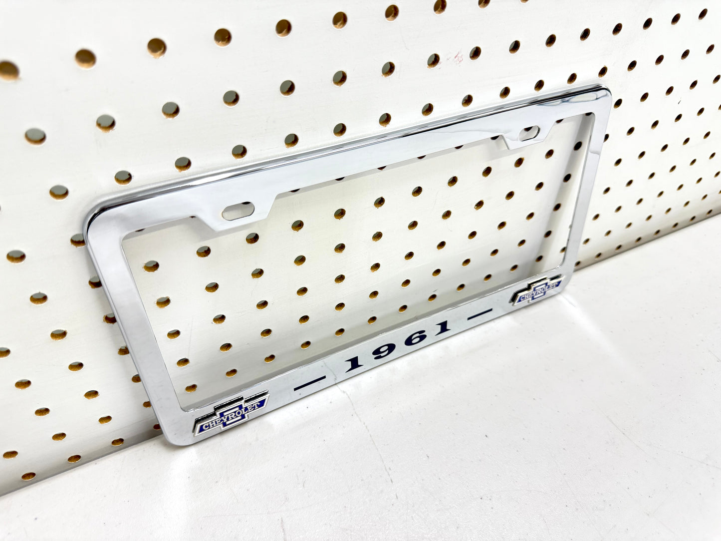 1961 CHEVROLET IMPALA, BEL AIR, BISCAYNE CHROME LICENSE PLATE FRAME WITH DUAL CHEVY BOWTIE LOGOS (2 HOLES)