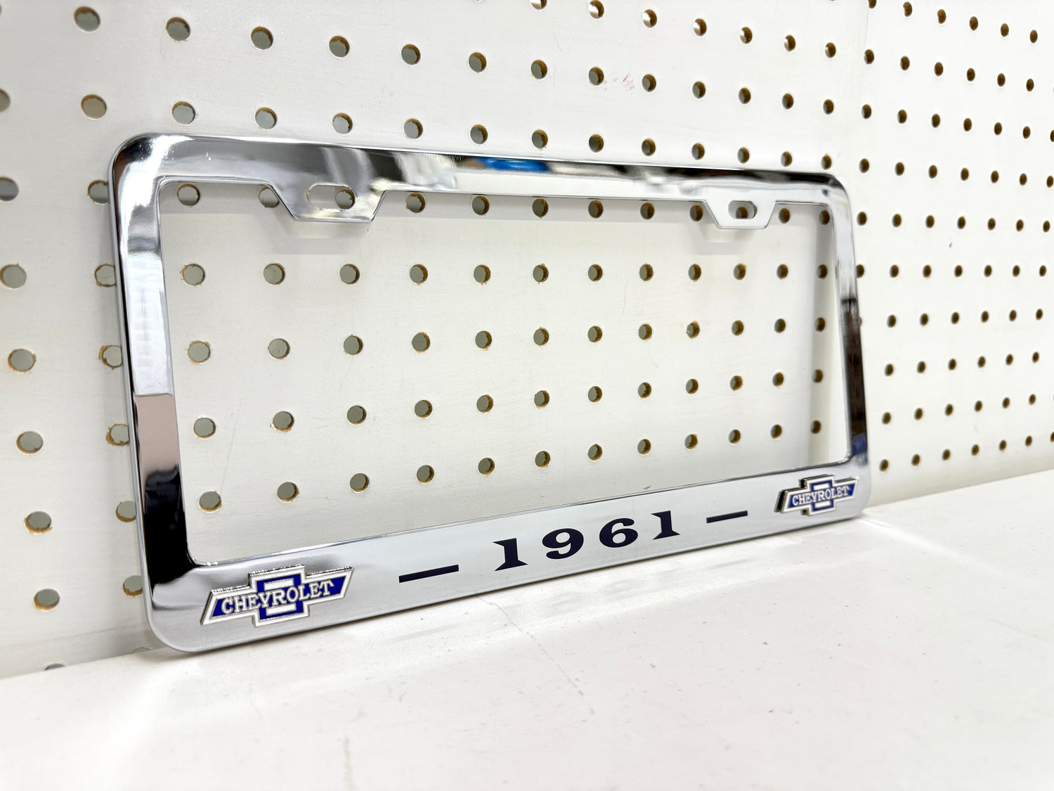 1961 CHEVROLET IMPALA, BEL AIR, BISCAYNE CHROME LICENSE PLATE FRAME WITH DUAL CHEVY BOWTIE LOGOS (2 HOLES)