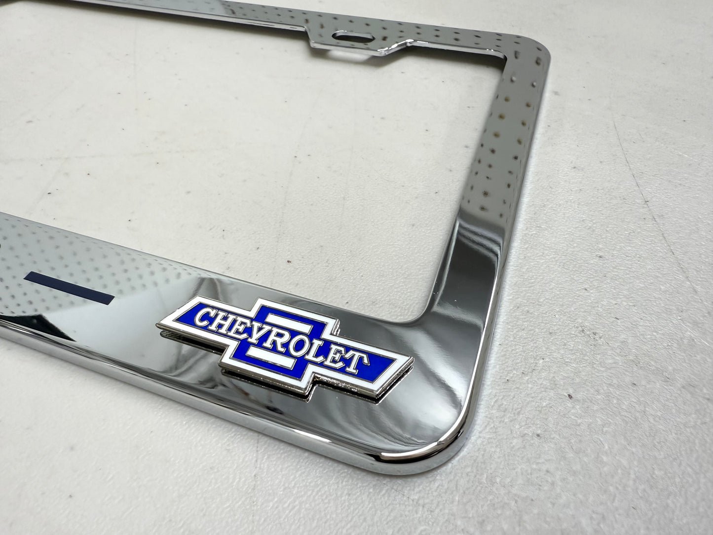 1965 CHEVROLET IMPALA, BEL AIR, BISCAYNE CHROME LICENSE PLATE FRAME WITH DUAL CHEVY BOWTIE LOGOS (2 HOLES)