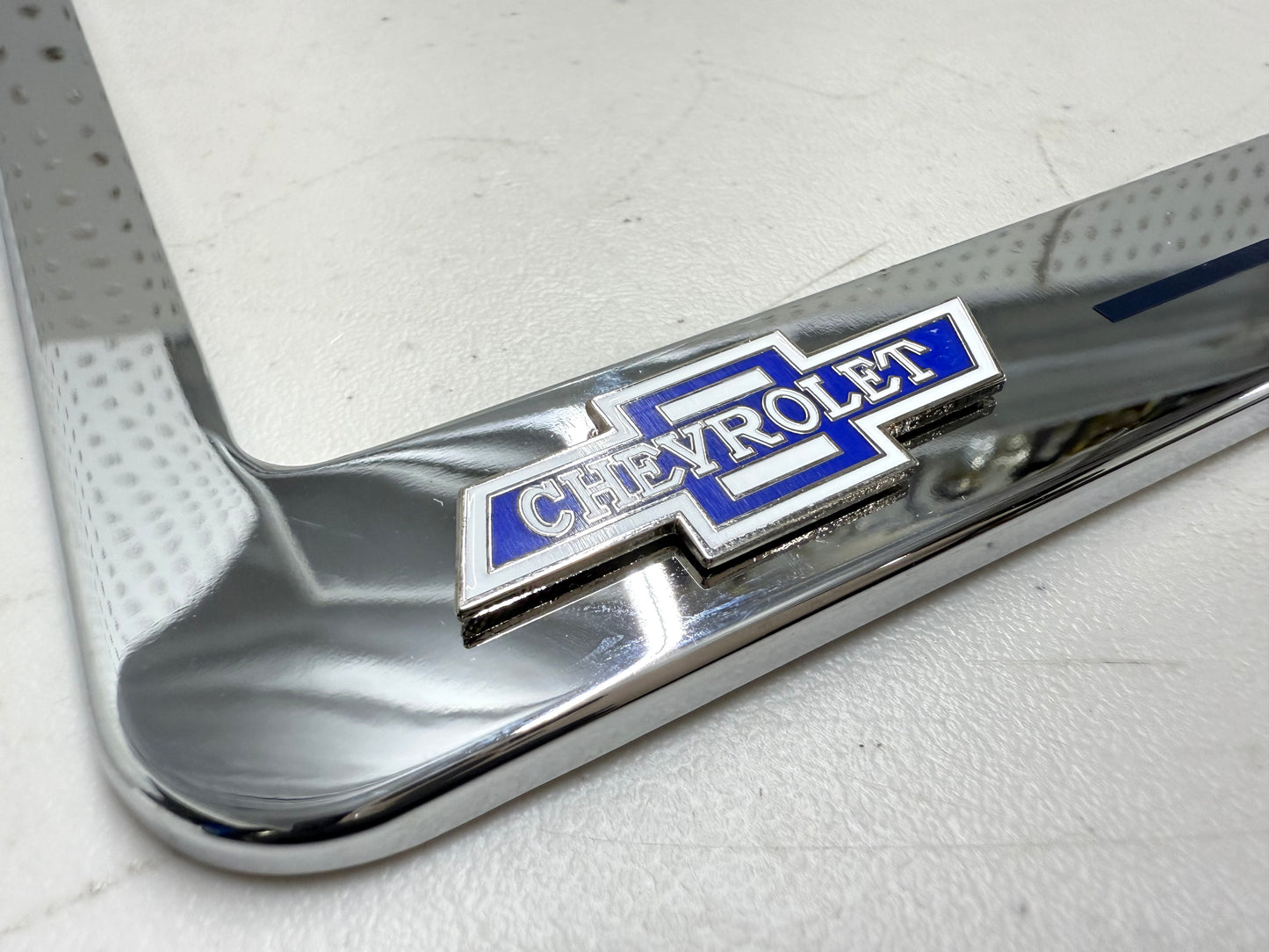 1961 CHEVROLET IMPALA, BEL AIR, BISCAYNE CHROME LICENSE PLATE FRAME WITH DUAL CHEVY BOWTIE LOGOS (2 HOLES)