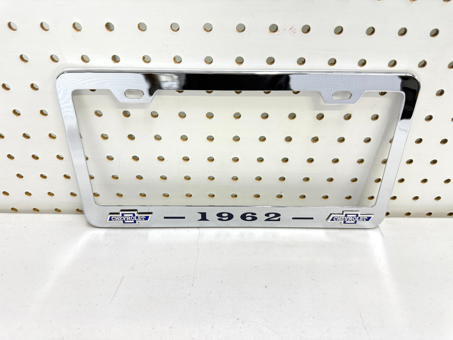 1962 CHEVROLET IMPALA, BEL AIR, BISCAYNE CHROME LICENSE PLATE FRAME WITH DUAL CHEVY BOWTIE LOGOS (2 HOLES)