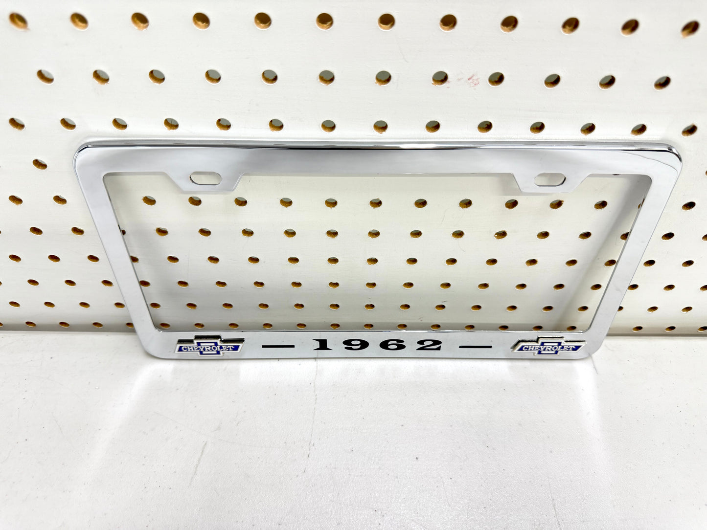1962 CHEVROLET IMPALA, BEL AIR, BISCAYNE CHROME LICENSE PLATE FRAME WITH DUAL CHEVY BOWTIE LOGOS (2 HOLES)