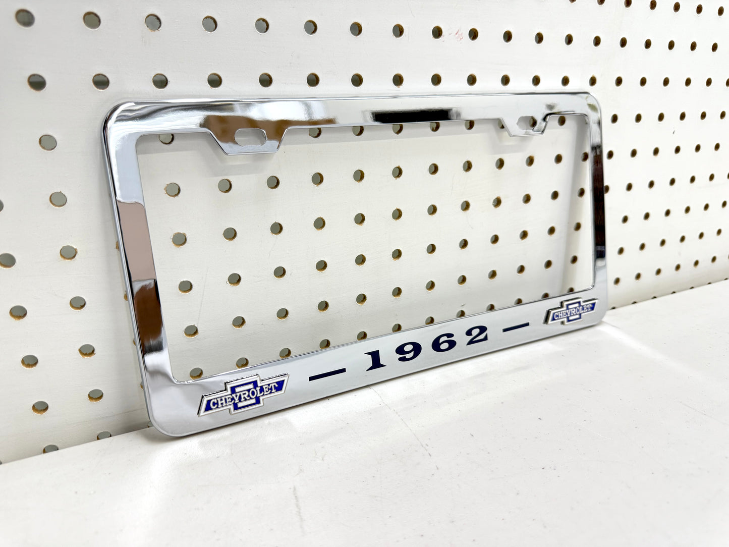 1962 CHEVROLET IMPALA, BEL AIR, BISCAYNE CHROME LICENSE PLATE FRAME WITH DUAL CHEVY BOWTIE LOGOS (2 HOLES)