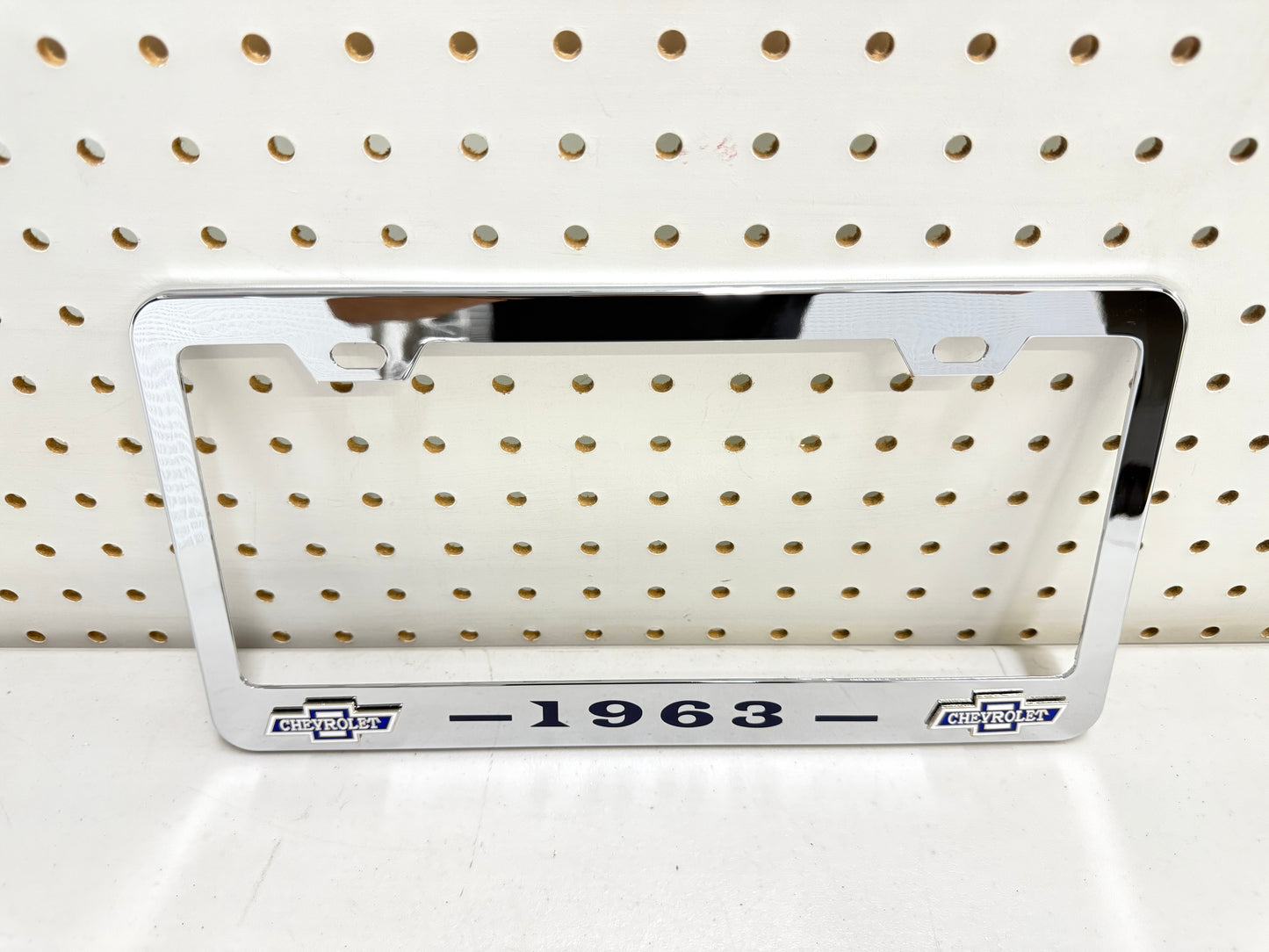 1963 CHEVROLET IMPALA, BEL AIR, BISCAYNE CHROME LICENSE PLATE FRAME WITH DUAL CHEVY BOWTIE LOGOS (2 HOLES)