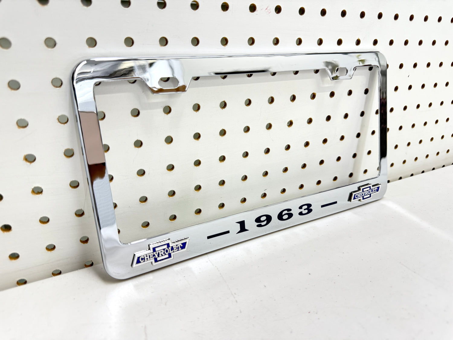 1963 CHEVROLET IMPALA, BEL AIR, BISCAYNE CHROME LICENSE PLATE FRAME WITH DUAL CHEVY BOWTIE LOGOS (2 HOLES)