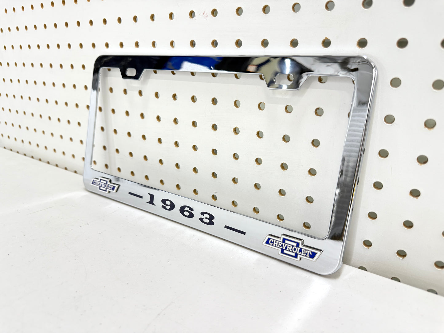 1963 CHEVROLET IMPALA, BEL AIR, BISCAYNE CHROME LICENSE PLATE FRAME WITH DUAL CHEVY BOWTIE LOGOS (2 HOLES)