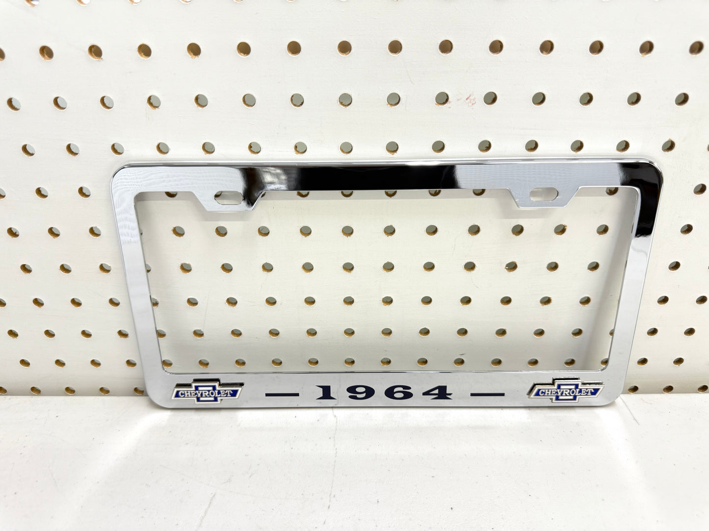 1964 CHEVROLET IMPALA, BEL AIR, BISCAYNE CHROME LICENSE PLATE FRAME WITH DUAL CHEVY BOWTIE LOGOS (2 HOLES)