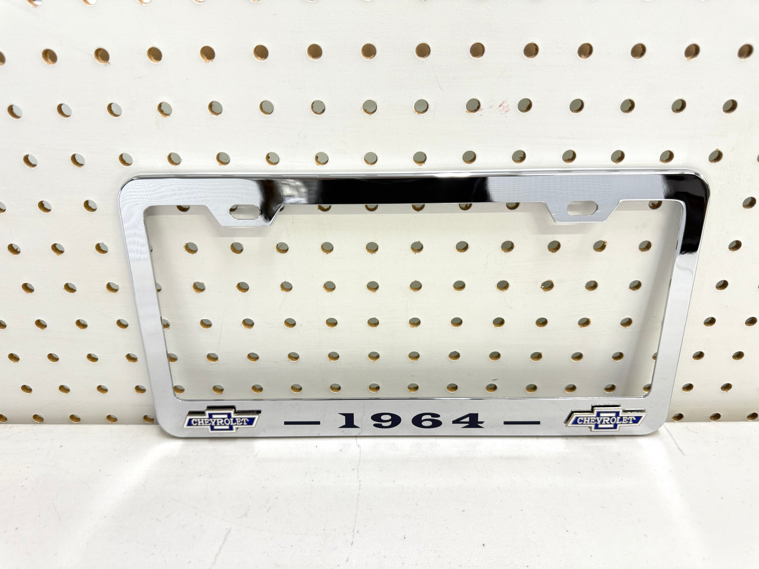 1964 CHEVROLET IMPALA, BEL AIR, BISCAYNE CHROME LICENSE PLATE FRAME WITH DUAL CHEVY BOWTIE LOGOS (2 HOLES)