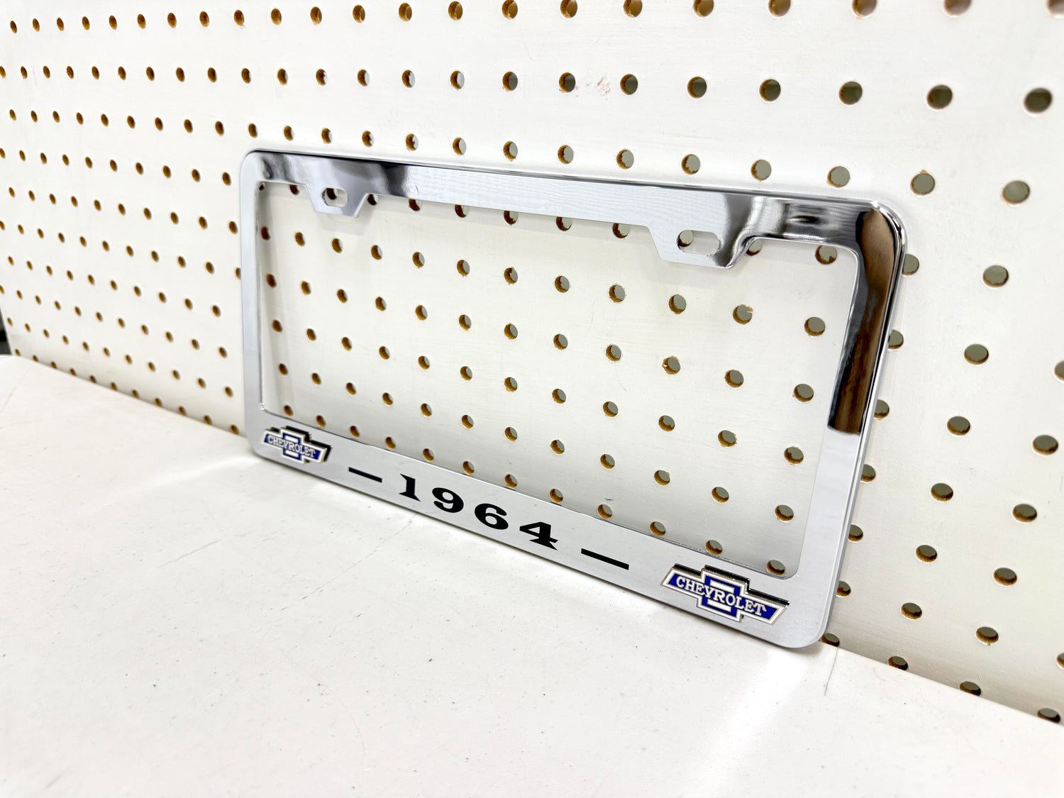 1964 CHEVROLET IMPALA, BEL AIR, BISCAYNE CHROME LICENSE PLATE FRAME WITH DUAL CHEVY BOWTIE LOGOS (2 HOLES)