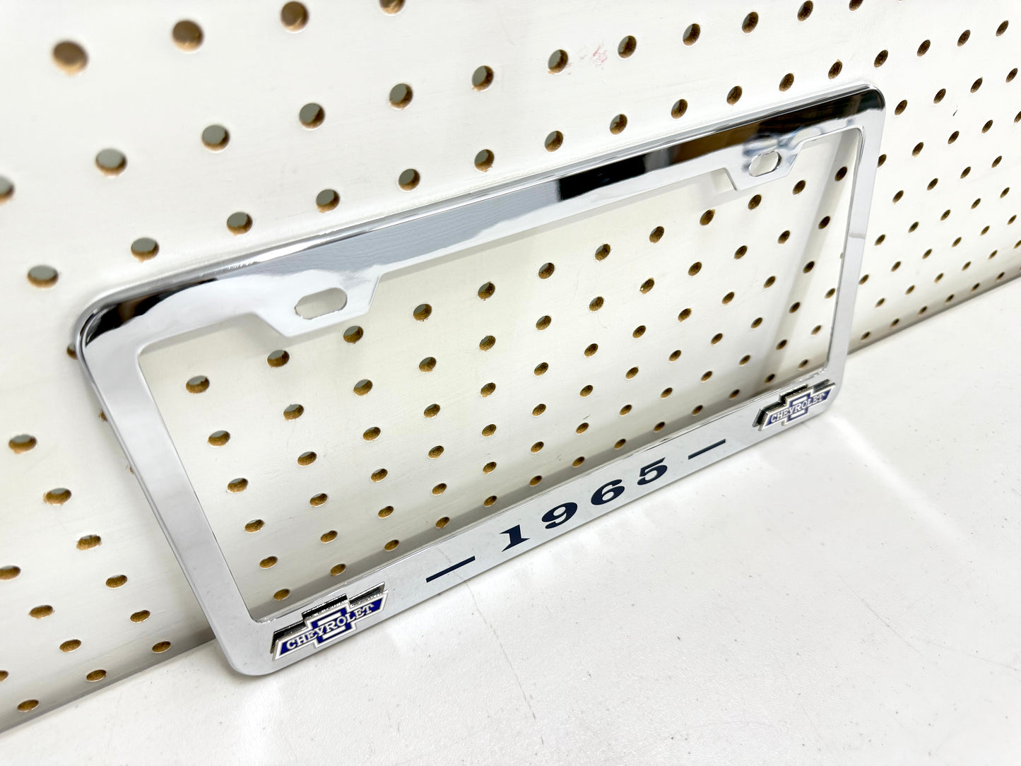 1965 CHEVROLET IMPALA, BEL AIR, BISCAYNE CHROME LICENSE PLATE FRAME WITH DUAL CHEVY BOWTIE LOGOS (2 HOLES)