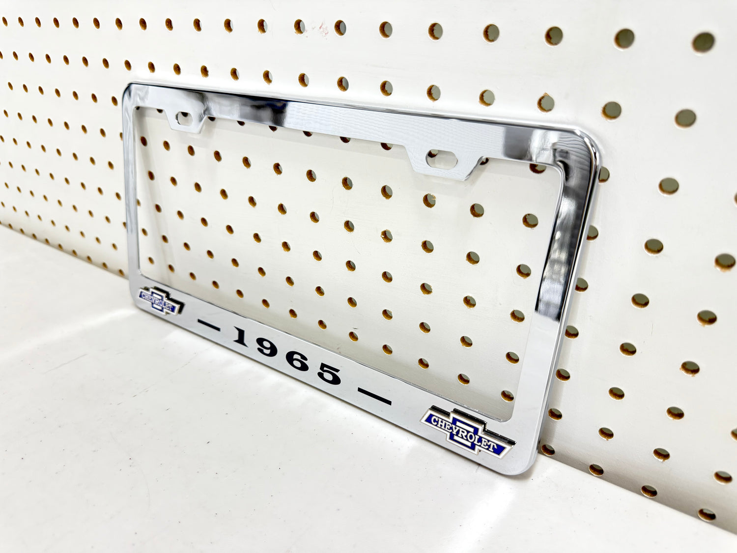 1965 CHEVROLET IMPALA, BEL AIR, BISCAYNE CHROME LICENSE PLATE FRAME WITH DUAL CHEVY BOWTIE LOGOS (2 HOLES)