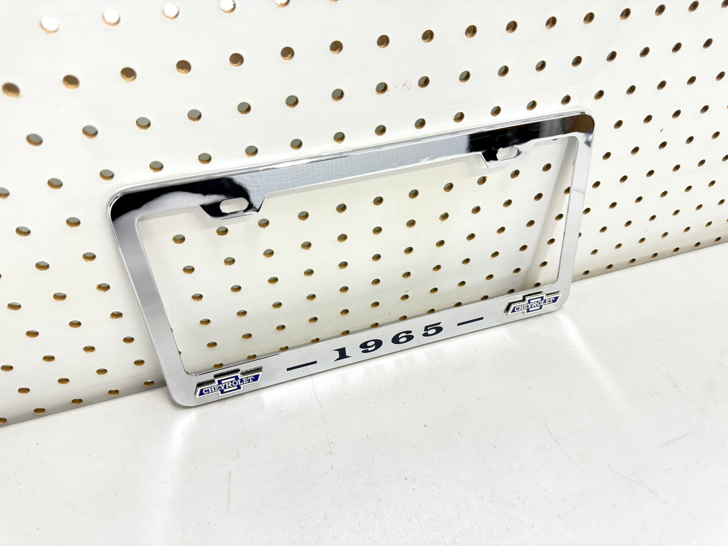 1965 CHEVROLET IMPALA, BEL AIR, BISCAYNE CHROME LICENSE PLATE FRAME WITH DUAL CHEVY BOWTIE LOGOS (2 HOLES)
