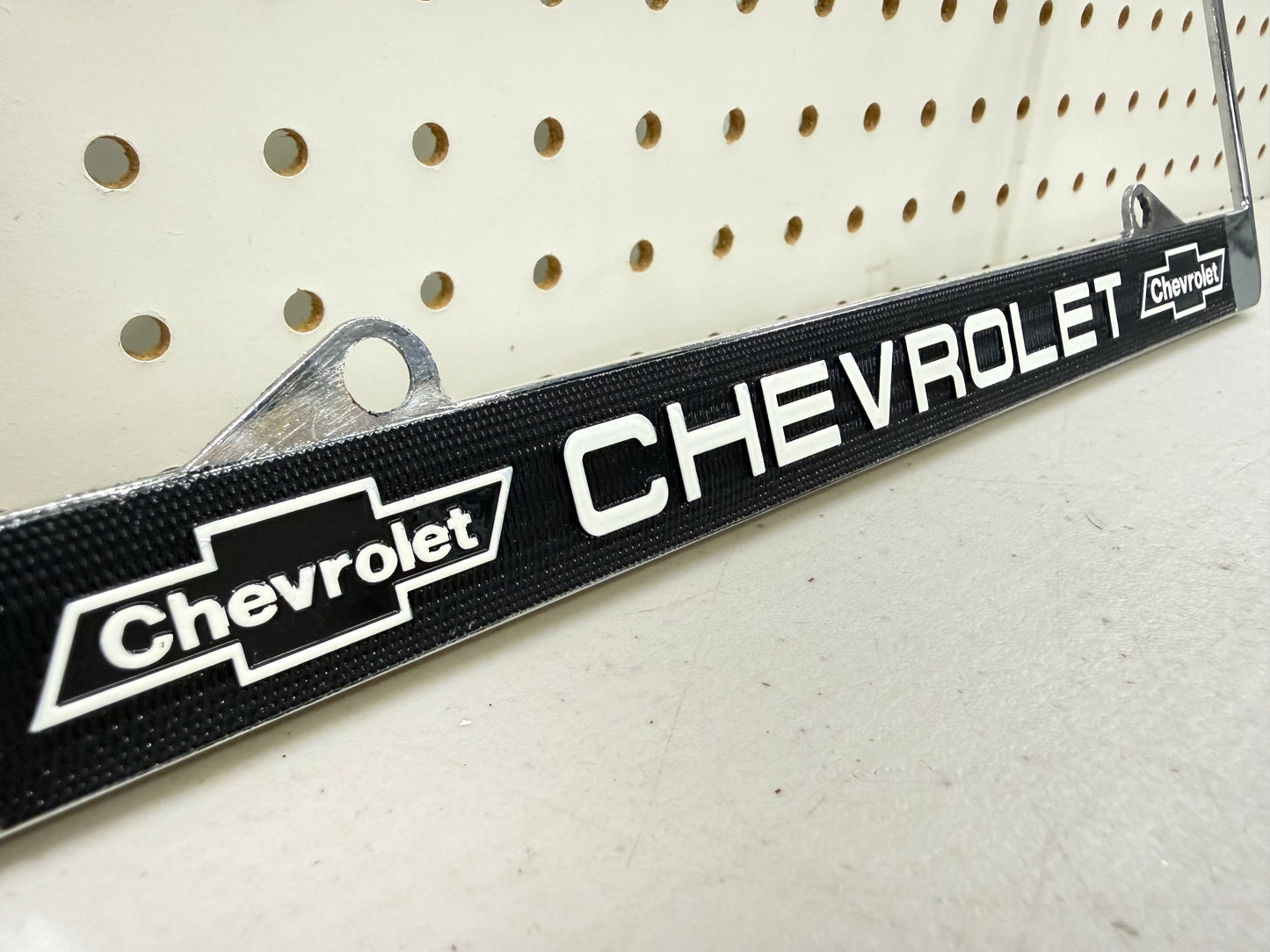 1965 CHEVY CHEVROLET GM LICENSED VINTAGE FRONT REAR LICENSE PLATE HOLDER RETAINER FRAME WITH DUAL BOWTIE LOGOS