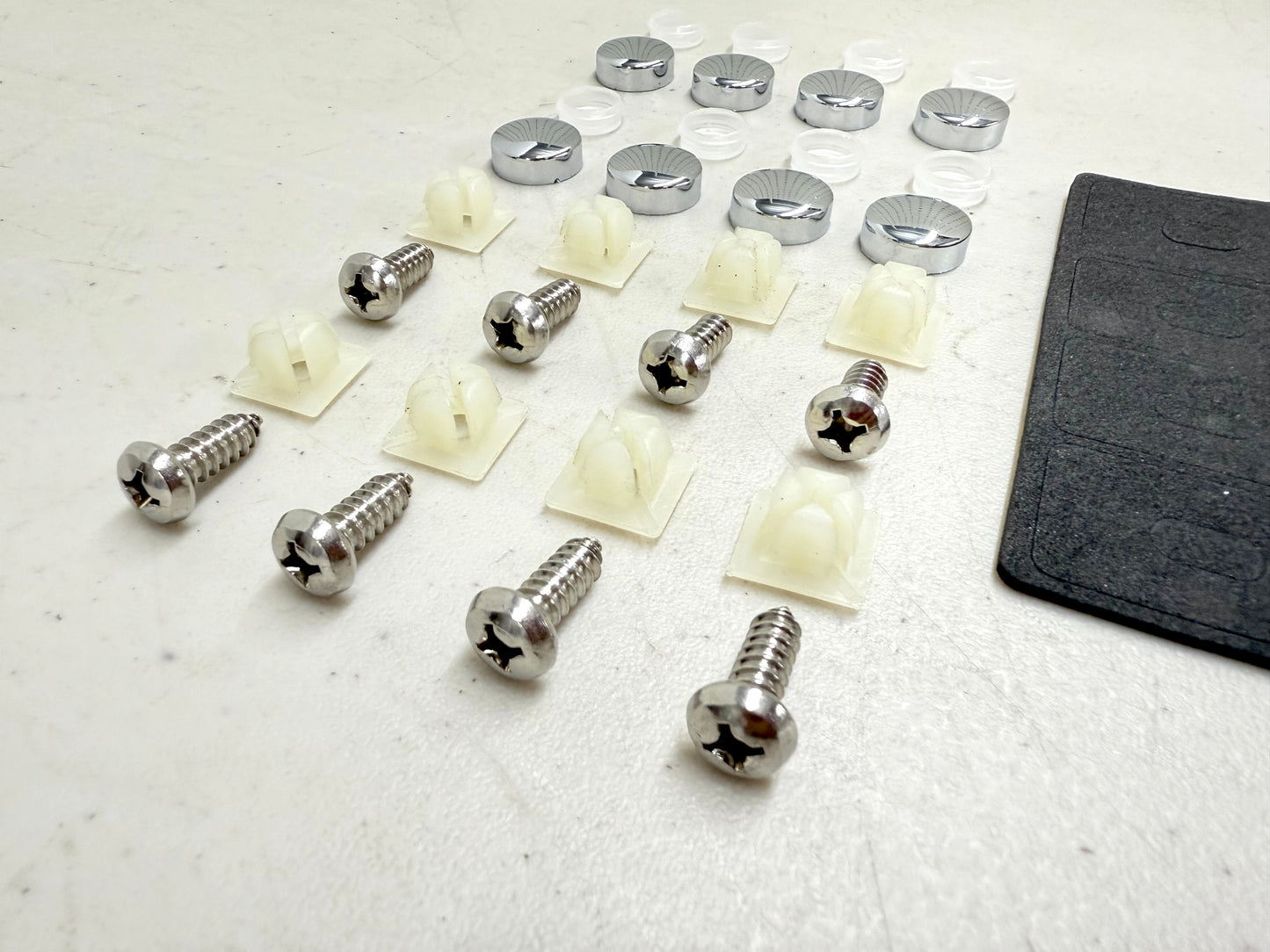 CHEVROLET IMPALA, BEL AIR, BISCAYNE CHROME LICENSE PLATE CAP AND FASTENER SET