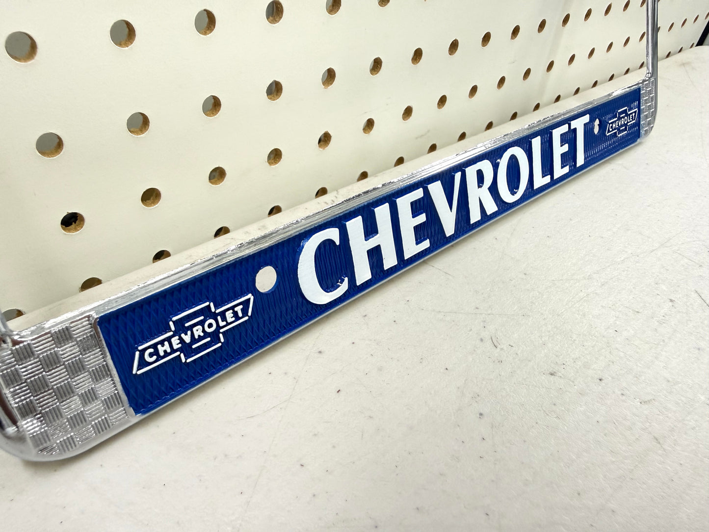 1960 CHEVY CHEVROLET GM LICENSED VINTAGE FRONT REAR LICENSE PLATE HOLDER RETAINER FRAME WITH DUAL BOWTIE LOGOS (BLUE)
