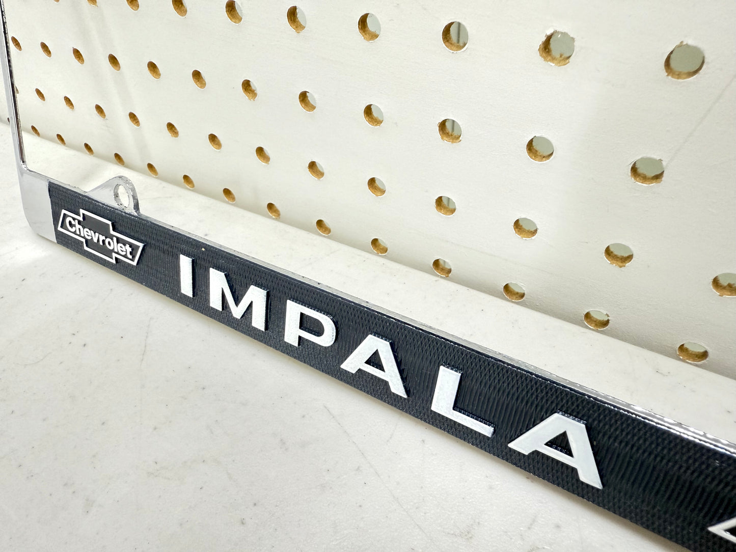 1958 CHEVY IMPALA GM LICENSED VINTAGE FRONT REAR LICENSE PLATE HOLDER RETAINER FRAME WITH DUAL BOWTIE LOGOS