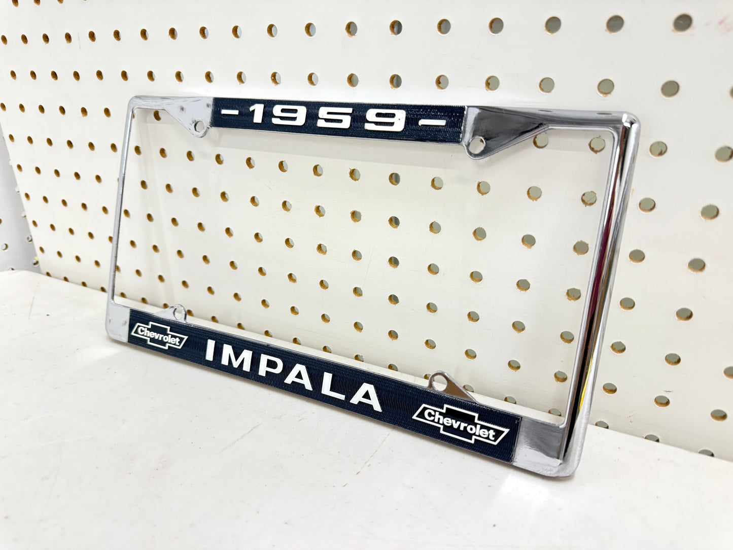 1959 CHEVY IMPALA GM LICENSED VINTAGE FRONT REAR LICENSE PLATE HOLDER RETAINER FRAME WITH DUAL BOWTIE LOGOS