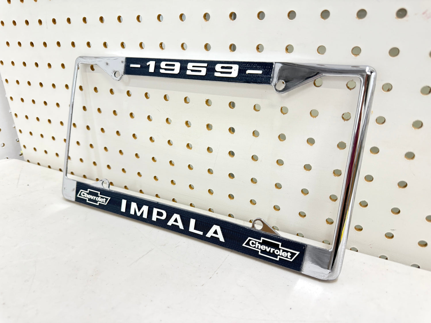 1959 CHEVY IMPALA GM LICENSED VINTAGE FRONT REAR LICENSE PLATE HOLDER RETAINER FRAME WITH DUAL BOWTIE LOGOS