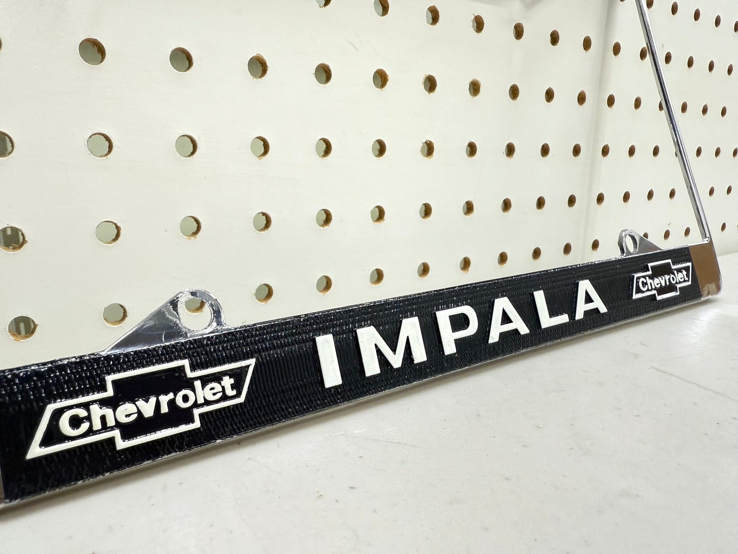 1965 CHEVY IMPALA GM LICENSED VINTAGE FRONT REAR LICENSE PLATE HOLDER RETAINER FRAME WITH DUAL BOWTIE LOGOS