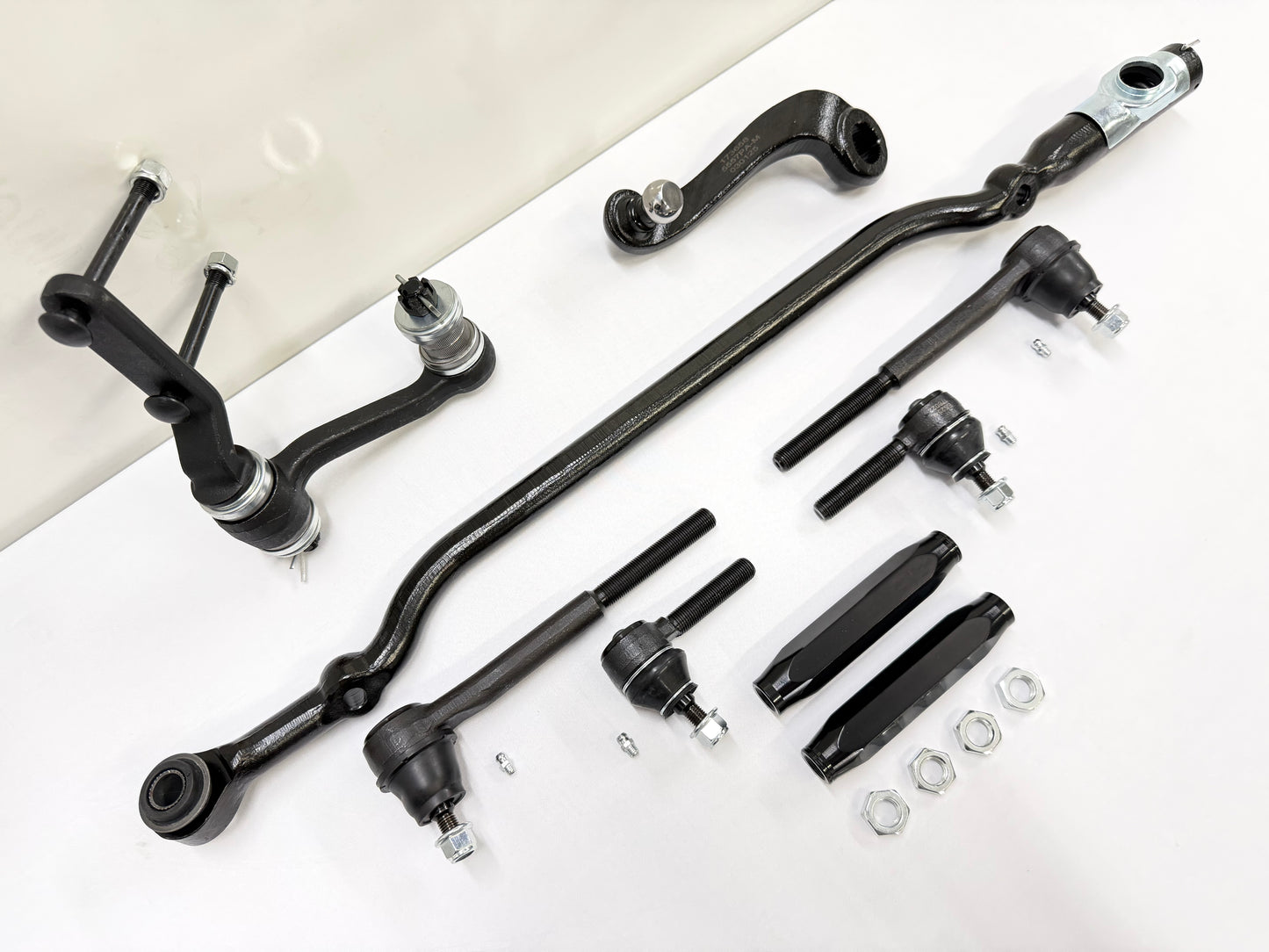 1955-57 GM CHEVY CHEVROLET BEL AIR NOMAD 210 150 TRI FIVE PREMIUM HEAVY DUTY COMPLETE STEERING LINKAGE KIT W/ IDLER ARM BEARING UPGRADE W/ BLACK SLEEVES