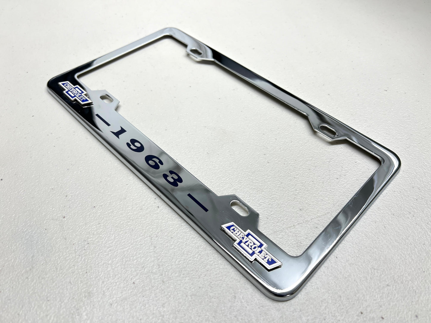 1963 CHEVROLET IMPALA, BEL AIR, BISCAYNE CHROME LICENSE PLATE FRAME WITH DUAL BOWTIE LOGOS