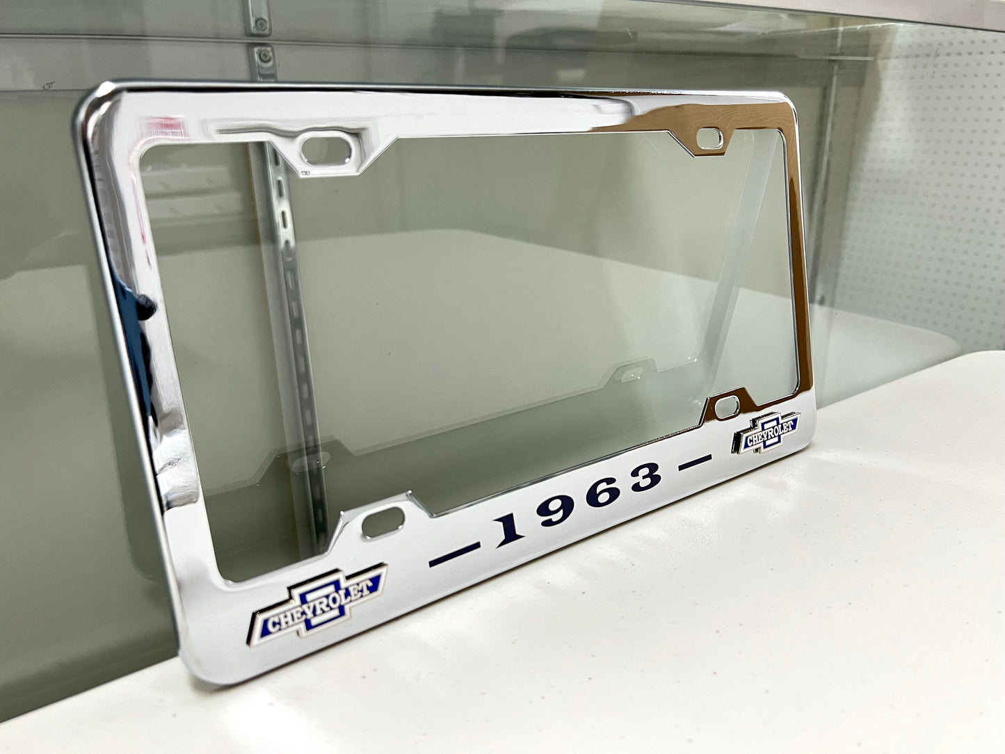 1963 CHEVROLET IMPALA, BEL AIR, BISCAYNE CHROME LICENSE PLATE FRAME WITH DUAL BOWTIE LOGOS