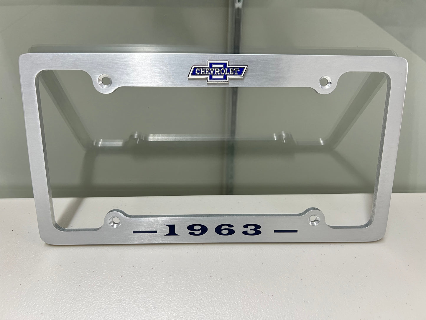 1963 CHEVROLET IMPALA, BEL AIR, BISCAYNE BRUSHED ALUMINUM LICENSE PLATE FRAME WITH BOWTIE LOGO