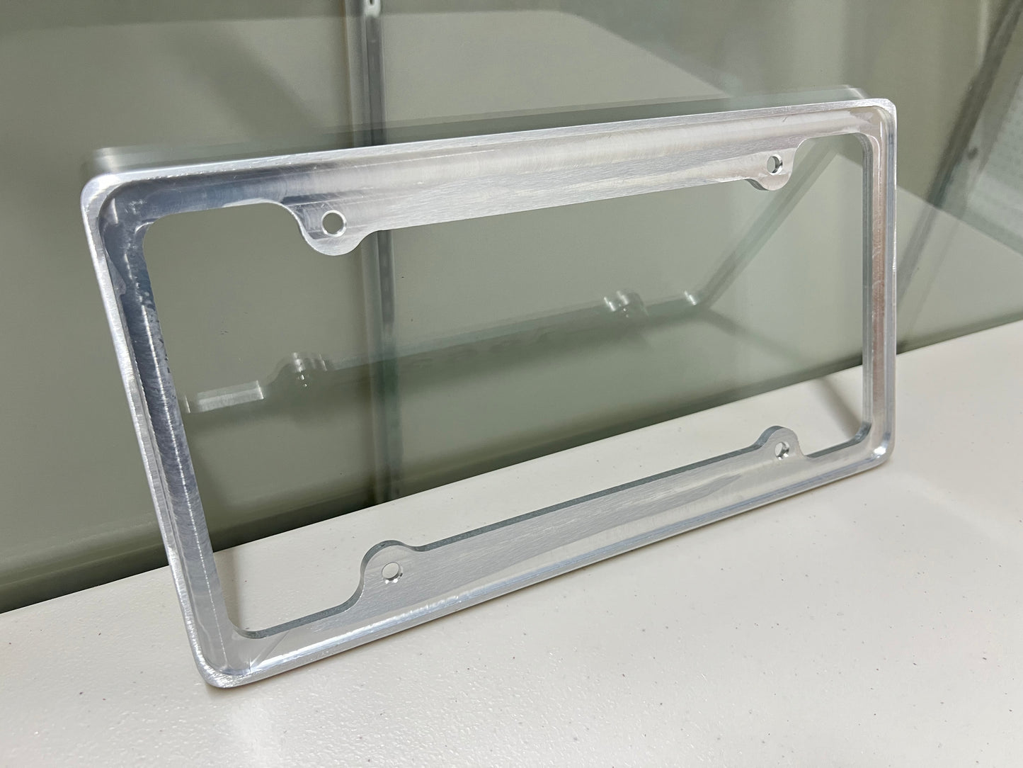 1963 CHEVROLET IMPALA, BEL AIR, BISCAYNE BRUSHED ALUMINUM LICENSE PLATE FRAME WITH BOWTIE LOGO