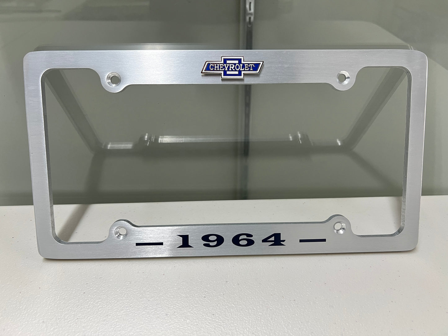 1964 CHEVROLET IMPALA, BEL AIR, BISCAYNE BRUSHED ALUMINUM LICENSE PLATE FRAME WITH BOWTIE LOGO